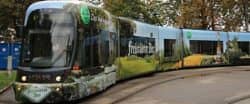 Straßenbahn Beklebung Folie Werbung